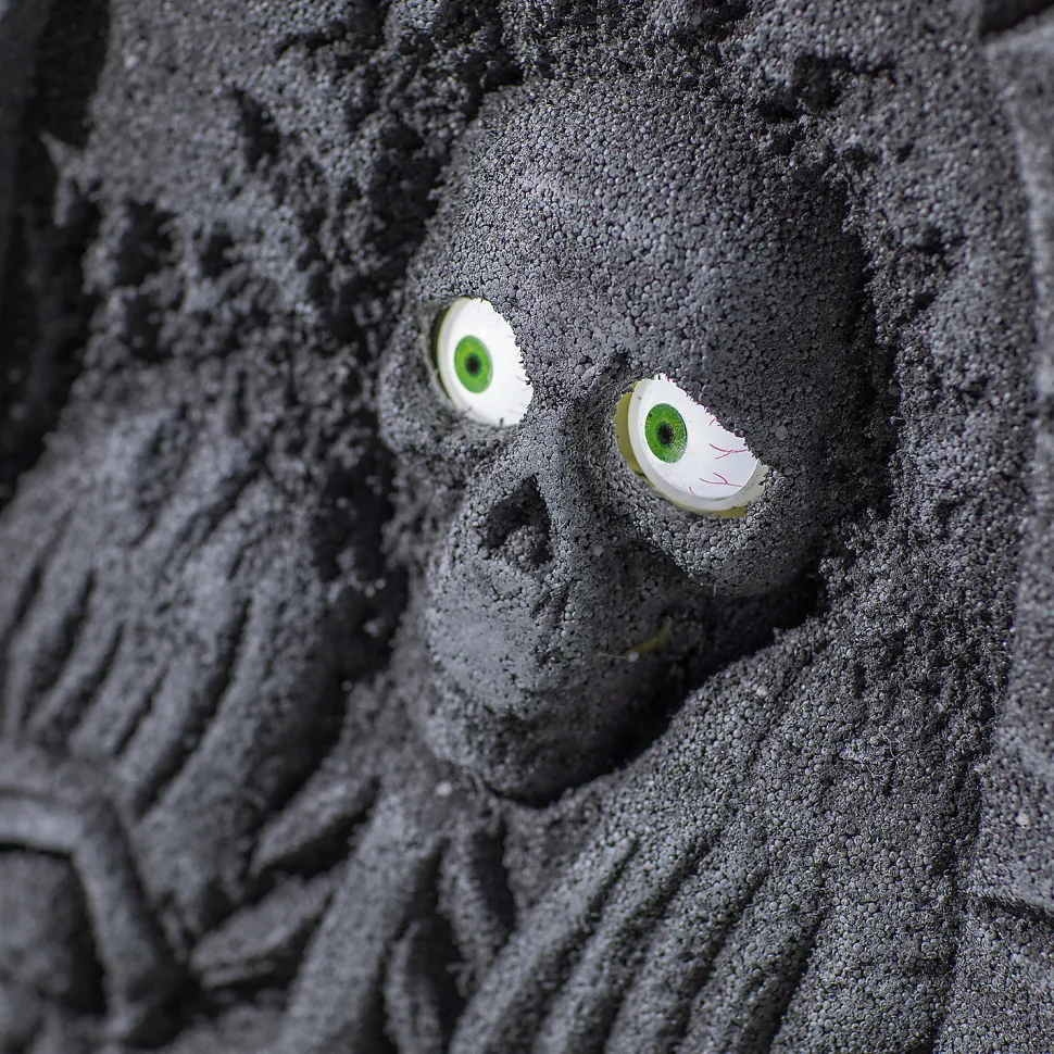 22” Gray Tombstone with Light-Up Moving Eyes Halloween Decoration